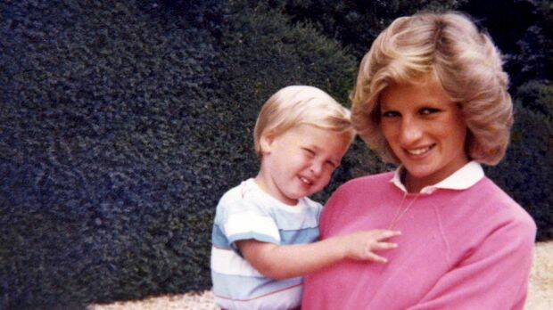 Princess Diana holding Prince William while pregnant with Harry, in a previously unseen photo which features in the new documentary. Photo: The Duke of Cambridge and Prince Harry
