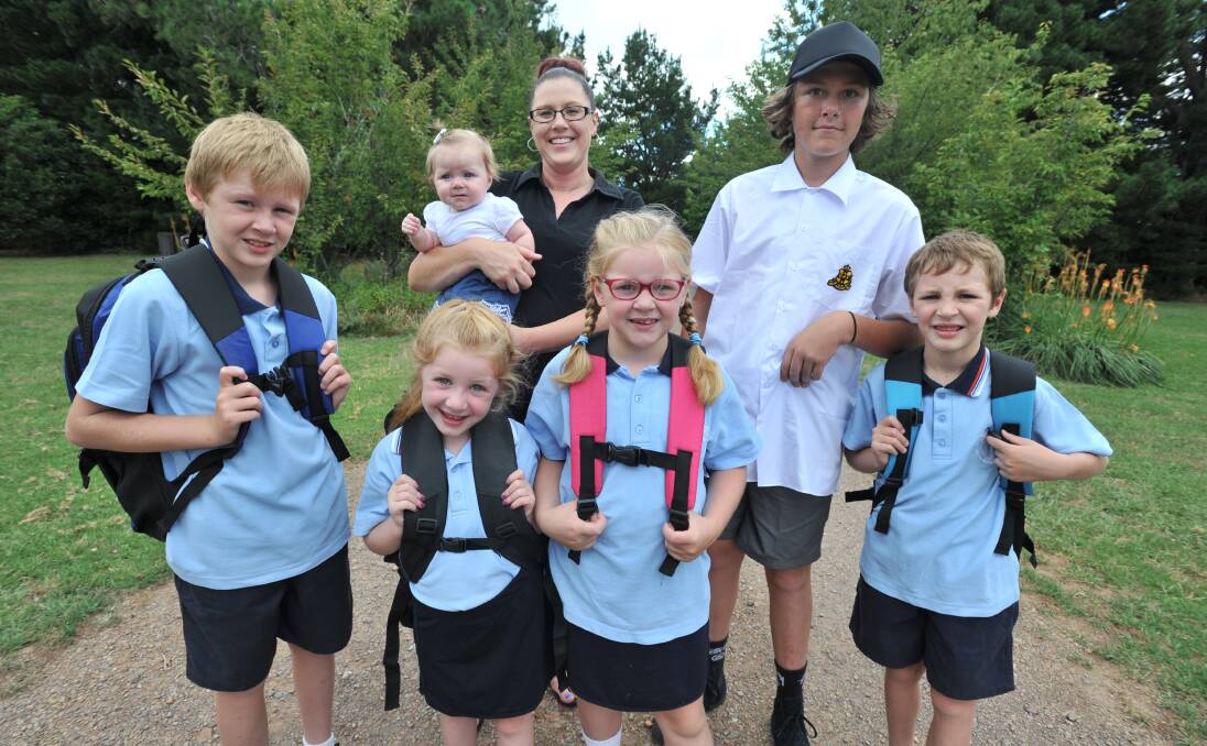 GOOD START: Rowan, Daisy, Ruby, Patience, Jeremy and Ethan Hannan with their resourceful mother Laura Photo: JUDE KEOGH 0127jkschool3