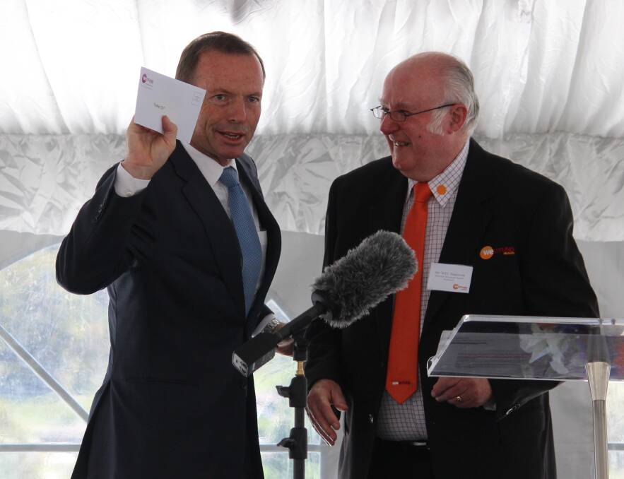 A WORTHY CAUSE: The Hon. Tony Abbott MP receives a donation for Soldier On from Westfund Director Wes Anderson.
