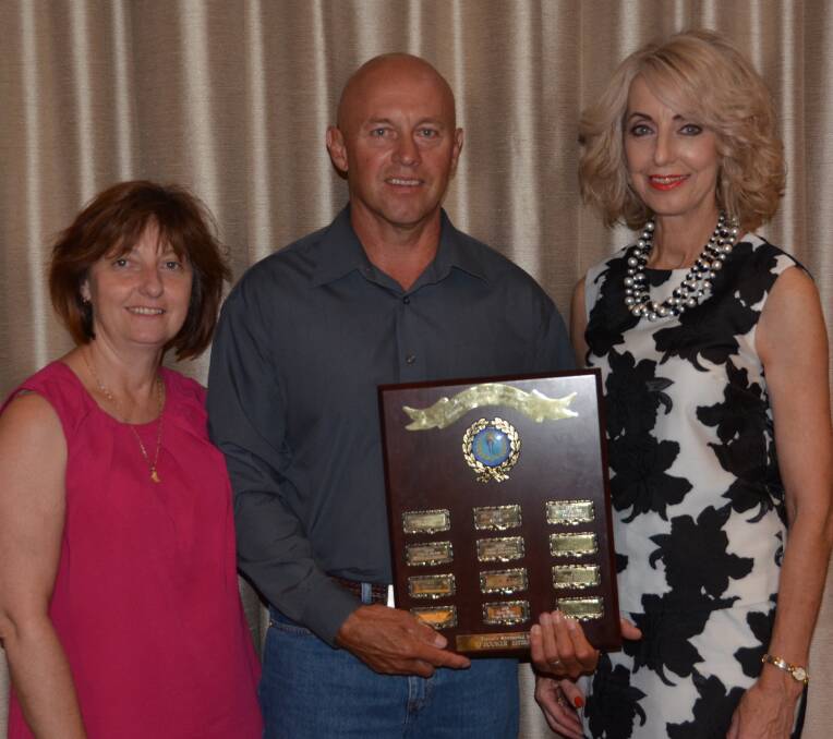 SENIOR SPORTS STAR: Zane Bray with his wife Karen (left) and then mayor Maree Statham.