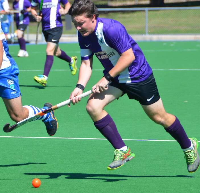 THREE TIME'S A CHARM: Panthers' Nic Milne, pictured in a game earlier in the season against St Pats, was a crucial part of his team's win over Orange Wanderers.