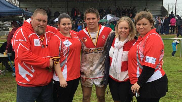 INSPIRATIONAL LEADER: Brock Campbell (centre), pictured with (from left) father and coach Scott, younger sister Nikita, older sister Dannielle Grossmith and mother Debbie, scored the grand final-winning try for Manildra and won several individual awards this year too. Photo: DANNIELLE GROSSMITH