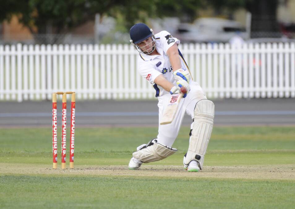 CRACK: St Pat's Old Boys captain Adam Ryan connects with a delivery in his side's third straight win. Pat's chased down Centennials Bulls' total with three wickets in hand. Ryan top scored with 25 not out. Photo: CHRIS SEABROOK