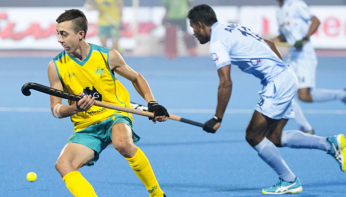 GREEN AND GOLD: Lithgow's Lachlan Sharp thought he scored his first Kookaburras goal against Spain but it was overturned on review. Here he is pictured in action in his debut against India. Picture: HOCKEY AUSTRALIA
