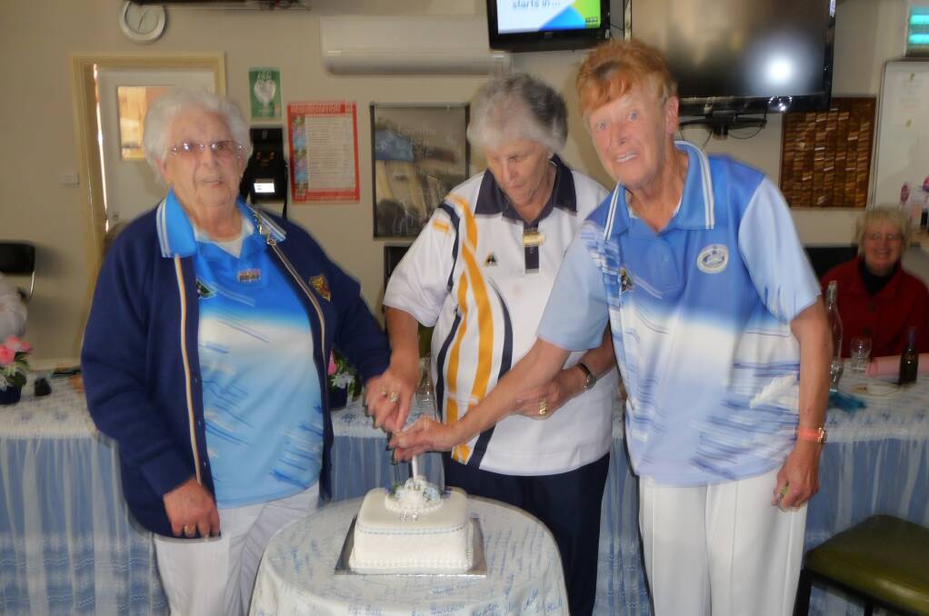 The 65th birthday cake was cut by patron Joyce Williams, Western District president Jean Wilde and Portland Women’s president Elsie Kirkwood.