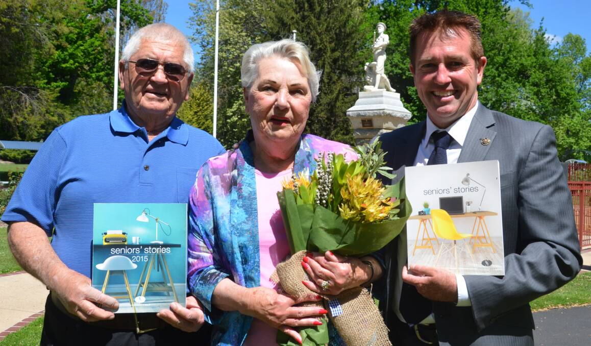 STORIES TO TELL: Lithgow's Yvonne Norris was thrilled to have her story "Tom" included in the Seniors’ Stories Volume 3. She is pictured with her husband Brian and Member for Bathurst Paul Toole. Picture: HOSEA LUY