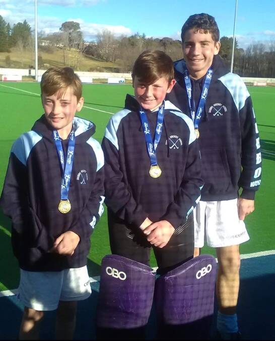 WINNERS: Lithgow hockey juniors McLeod Dean, Ashton McDonald and Dayne Houlison proudly displaying their gold medals.