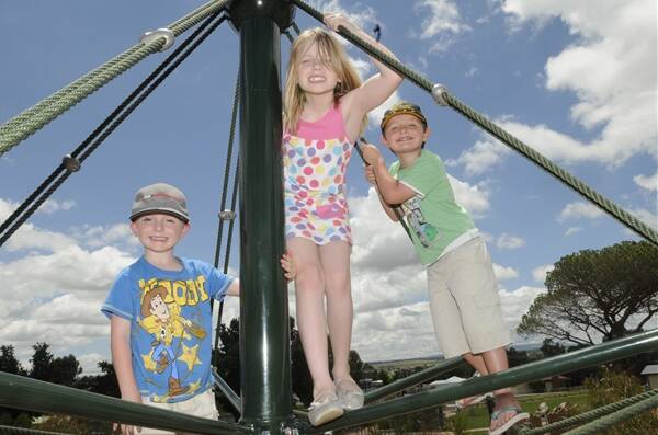 ADVENTURE PLAYGROUND: Lithgow could soon be getting an adventure playground Lithgow Council's funding submission is approved. Ella Cohen, Lachlan and Mitchell are pictured having fun at the adventure playground in Bathurst. Photo: CHRIS SEABROOK