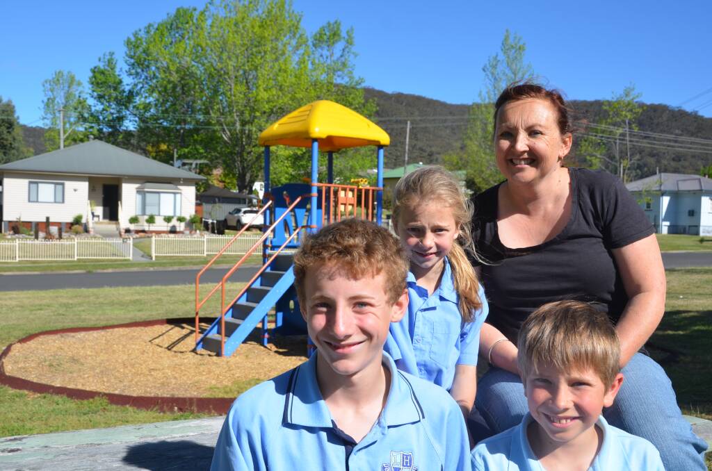 The Doran family of South Bowenfels including mother Sonia and children Jane, Sam and Luke would welcome an adventure park in Lithgow with open arms. Picture: HOSEA LUY