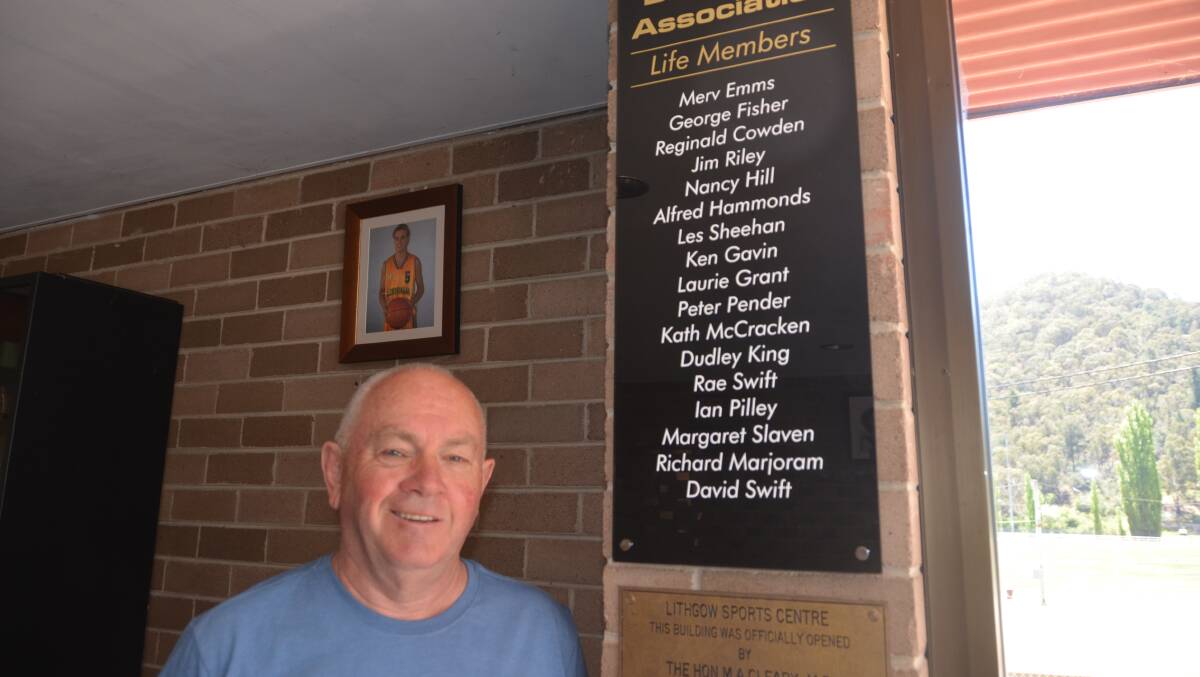 DESERVED RECOGNITION: Head of Lithgow Basketball Richard Marjoram alongside the recently mounted plaque recognising the association's life members. Picture: HOSEA LUY