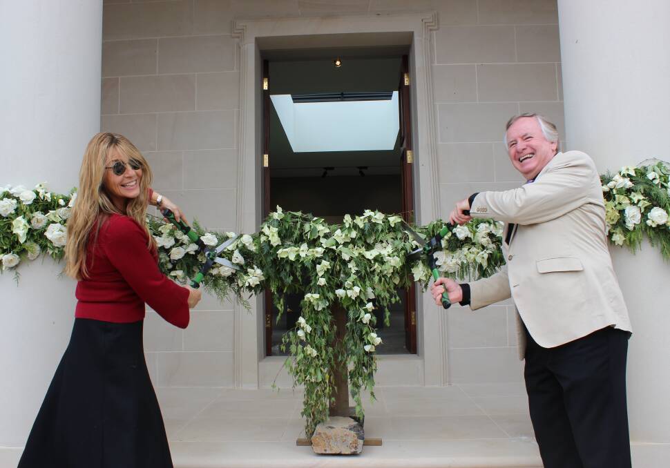 GRAND OPENING: Owner Evelyn Hawkins and Graham Ross VMM officially opened Mayfield's new Gallery on Monday. Photo: SUPPLIED