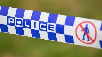 A man is dead and a woman has suffered serious head injuries at a home north of Brisbane. (James Ross/AAP PHOTOS)