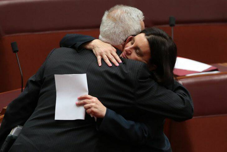 Senator Jacqui Lambie with Senator Doug Cameron after she informed the Senate she intends to resign because of dual citizenship by descent at Parliament House in Canberra on Tuesday 14 November 2017. Fedpol. Photo: Andrew Meares