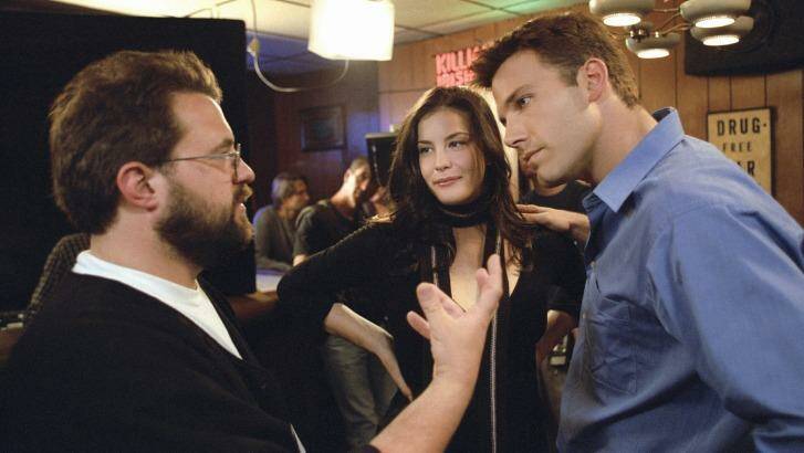 Director Kevin Smith, left, with Liv Tyler and Ben Affleck on the set of 2004 film <i>Jersey Girl</i>. Photo: AP Photo/Miramax, Peter Sorel