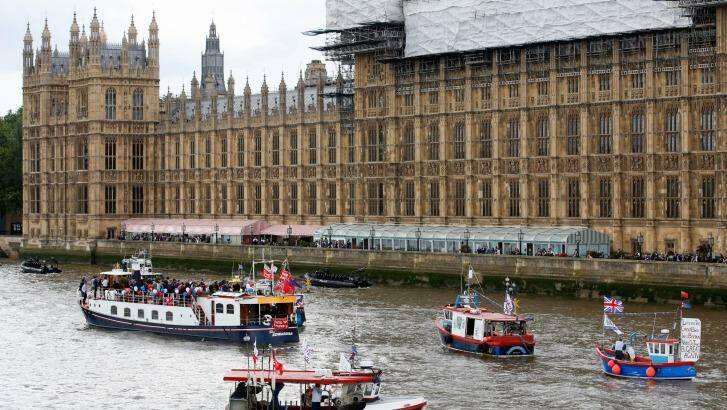 Fishermen and campaigners for the "Leave" campaign demonstrate in boats outside the Houses of Parliament in London on Wednesday. Photo: Luke MacGregor