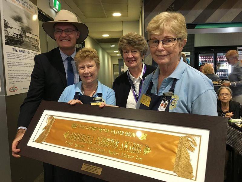 CWA volunteers will tirelessly serve nearly 4,000 scones a day to crowds at the Easter Show.