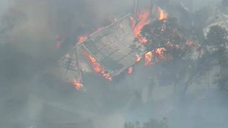 A house is destroyed by fire on Cliff Drive at Katoomba. Photo: Channel Nine