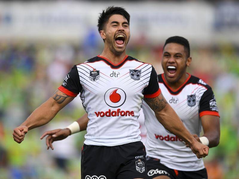 Shaun Johnson celebrates after kicking the winning field goal against Canberra.