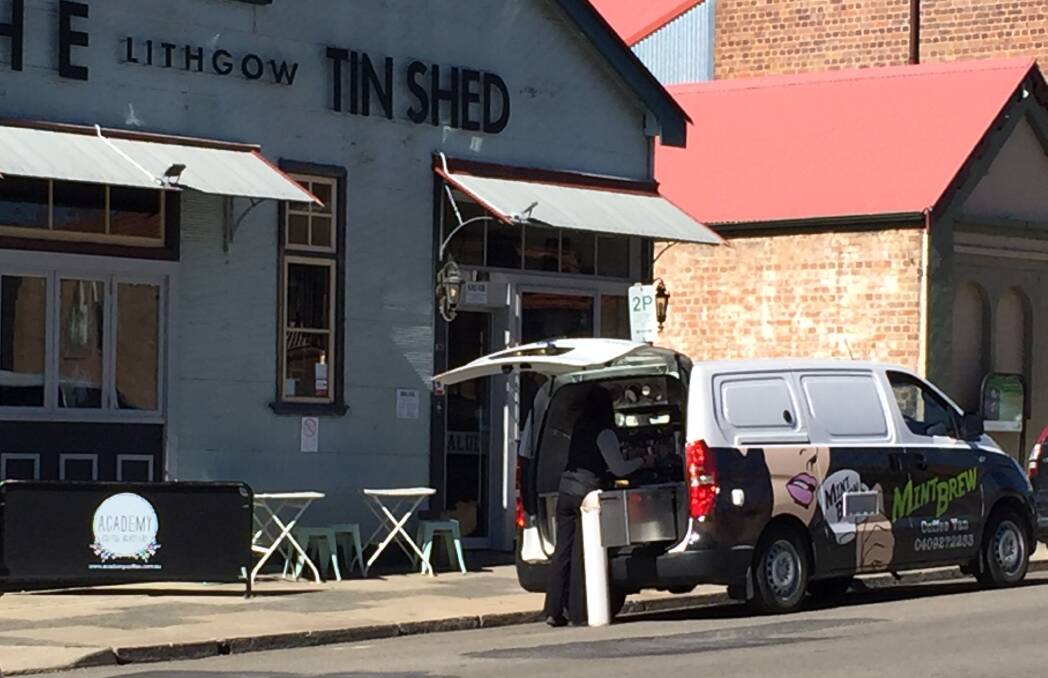 STILL TRADING: The Tin Shed continued to serve coffee from their van. 