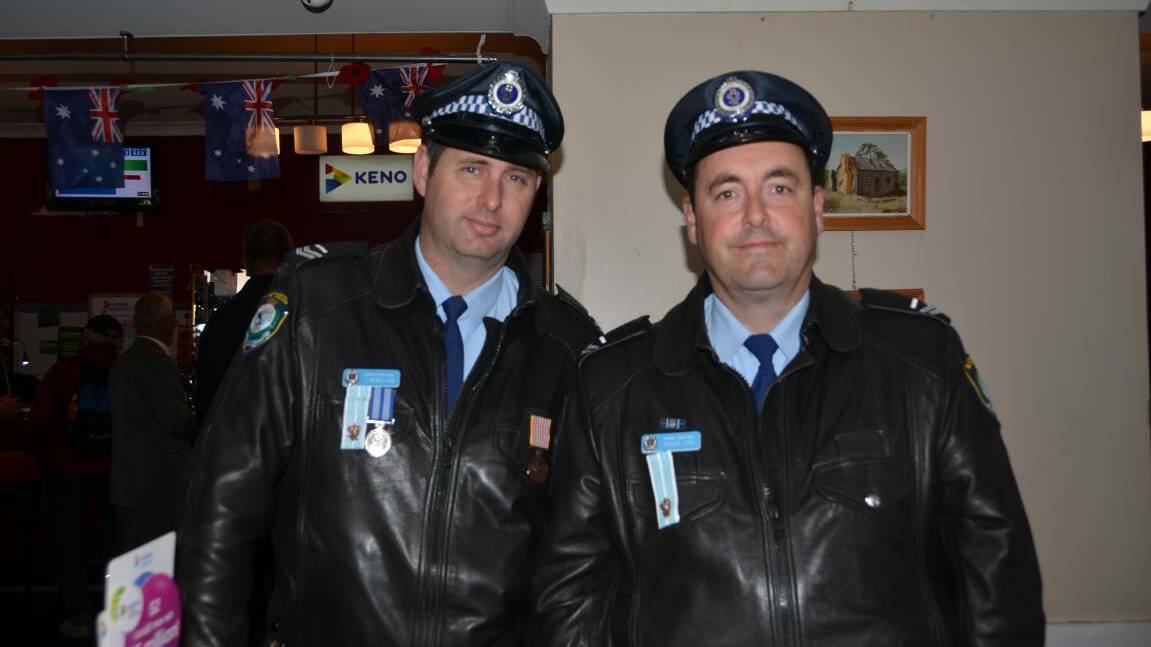 AWARD FOR BRAVERY: Senior Constable James McMillan with fellow Portland police officer Senior Constable Roger Taig (right). 