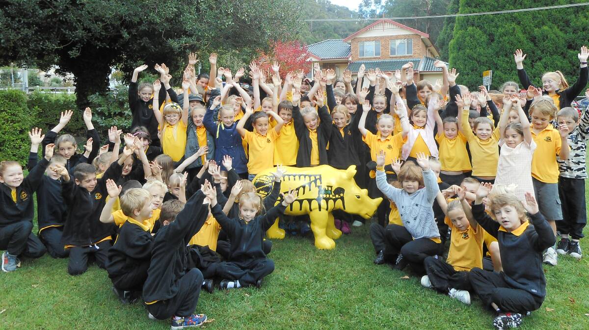 THRILLED: Students from Zig Zag Public School celebrate the return of their mascot which was stolen in October last year. Picture: SUPPLIED. 