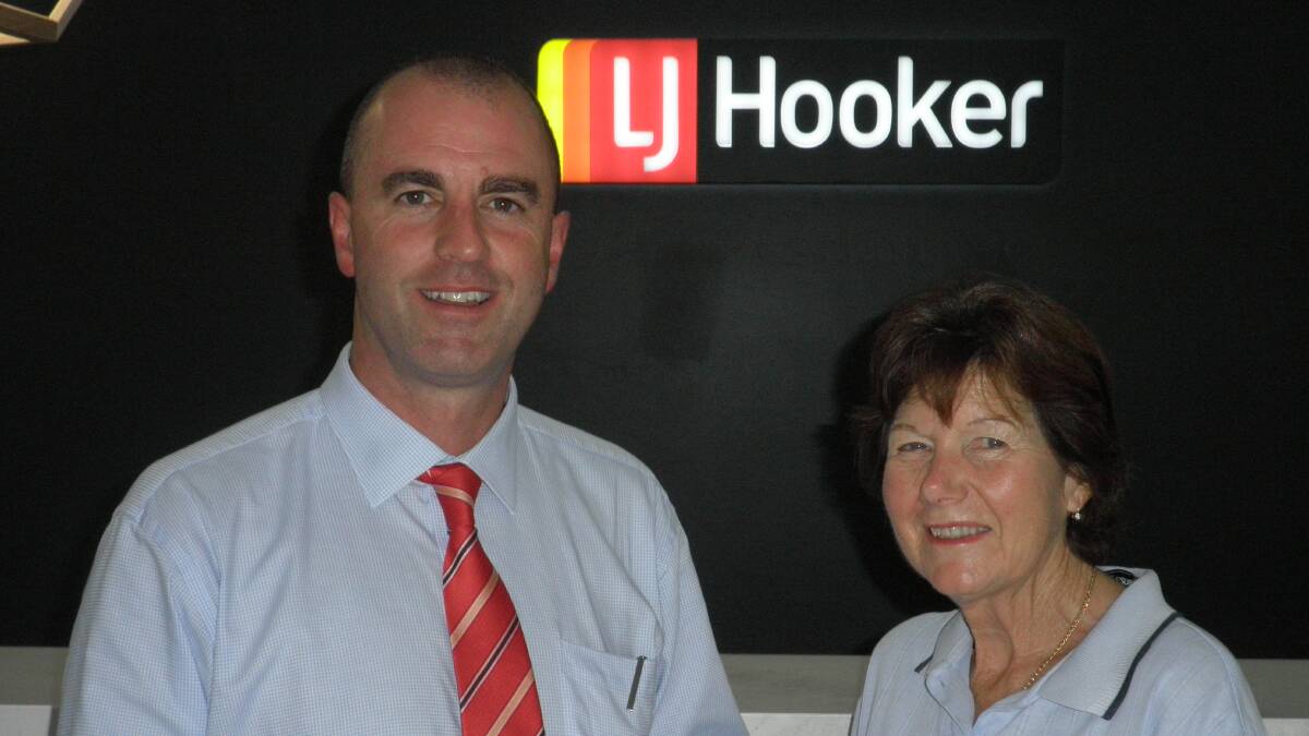 SUPPORT FOR GOLF SEASON: Ladies President Judi Moore accepting sponsorship cheque from Jamie Giokaris of LJ Hooker. Picture: SUPPLIED. 