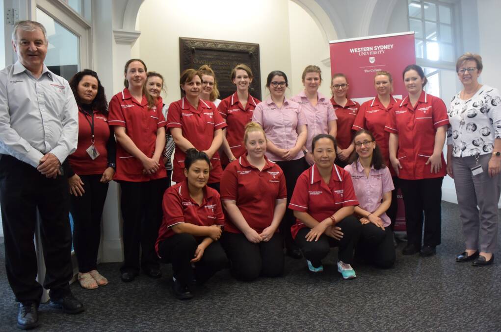 FIRST YEAR DONE: Nursing students from the University of Western Sydney will be saying farewell to the Lithgow campus. They are pictured with university staff.