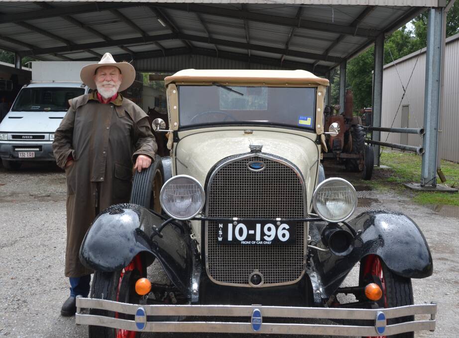 IN THE WET: Ian de Beuzeville with his 1928 Model A Ford at the Lithgow Show. Picture: HOSEA LUY. 