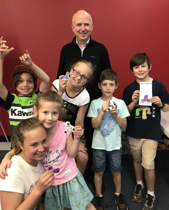WELCOME BACK: School returned Monday after holiday activities, including this fidget spinner workshop at Wallerawang Library last week. Picture: SUPPLIED. 