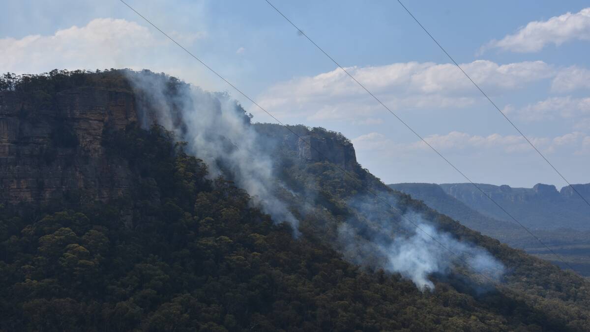 SMOKE RISING: The fire in the Wolgan Valley on Tuesday afternoon, February 13. Picture: CIARA BASTOW. 