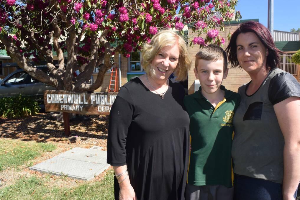 GENERATIONS OF COOERWULL STUDENTS: Toni MacDonald with her daughter Erin Ellery and grandson Max. Picture: KIRSTY HORTON. 