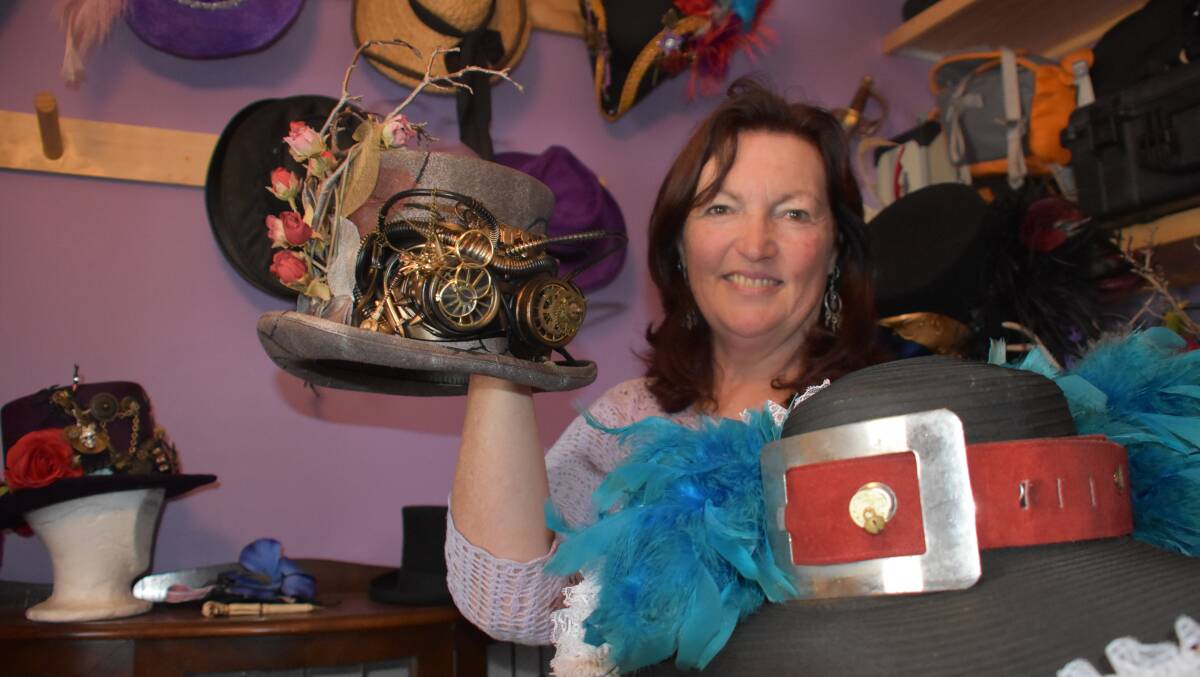 ALL FOR FUN: Raine Doyle with some of the hats she has designed. Picture: KIRSTY HORTON. 