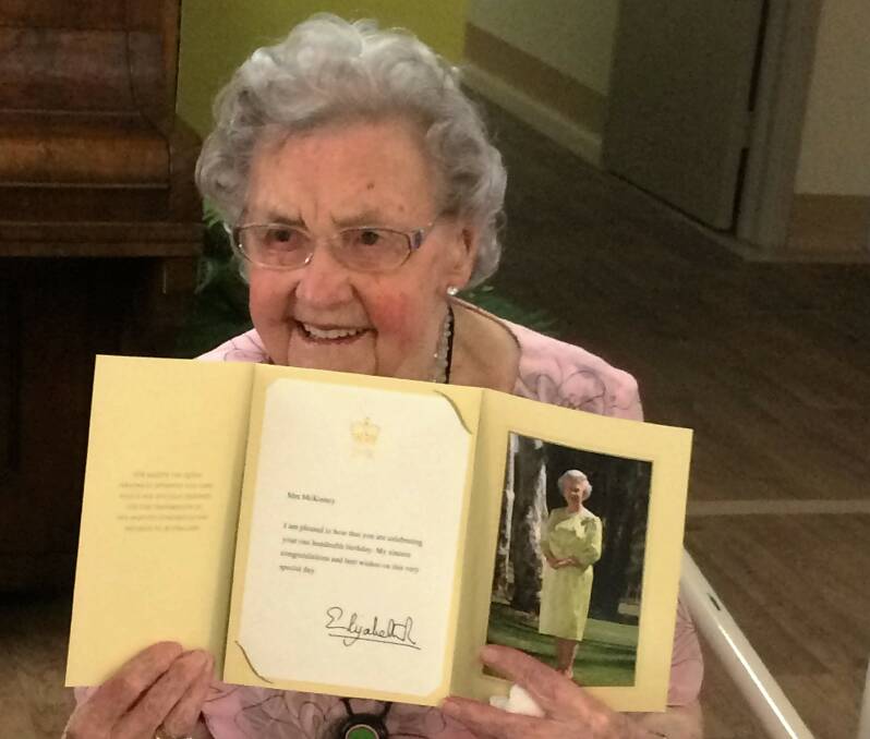 100: Thelma McKinney with her letter from the Queen. Picture: SUPPLIED. 