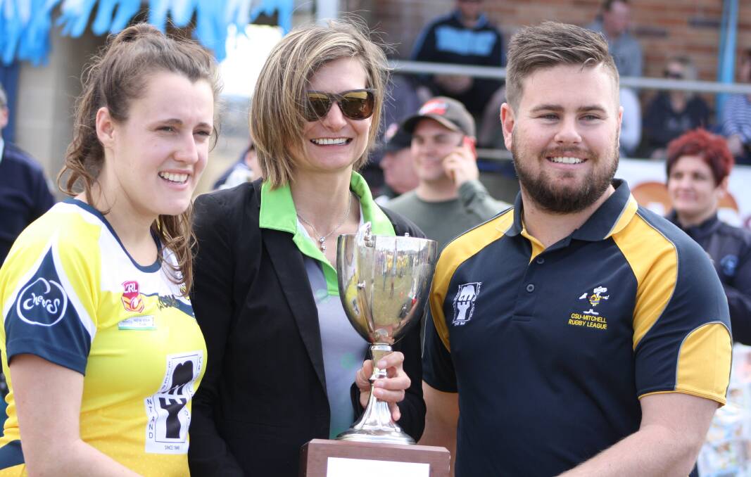 WINNERS: CSU Yellow claims the New Era Cup trophy. 