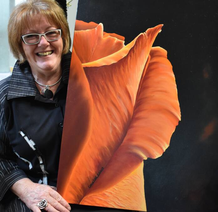 SHOW TIME: Artist Linda Hine with one of her works destined for the Portland Art Show this weekend. She is a regular contributor to the Lithgow Show art display. Picture: KIRSTY HORTON. 
