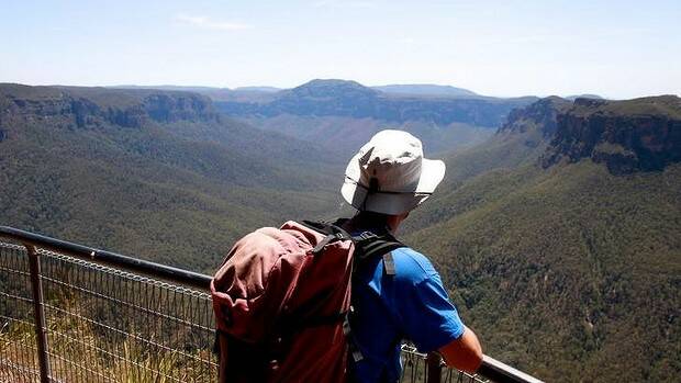 In this file photo, a man is pictured at Evans Lookout. A woman has fallen off the edge of the cliff in front of her friends. Photo: Edwina Pickles