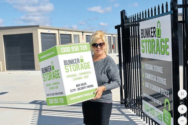 TIME TO GO ‘UNDER WRAPS: Lithgow Mercury advertising consultant Mandy Wright at the new rental storage facility in Brays Lane at Wallerawang