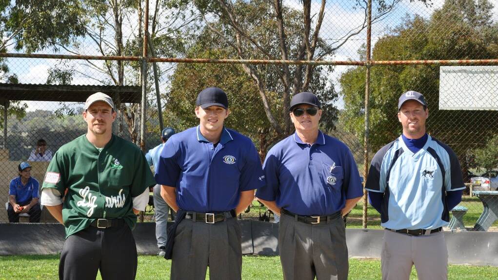 BOTH SIDES: Lizard's Pete Nunan and Cougar's Pete Munday with umpires Riley and Peter Barrington