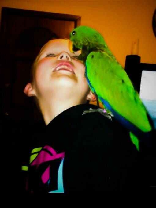 PARROT TALK: Coby with feathered friend Jack 	lm041014selfie6