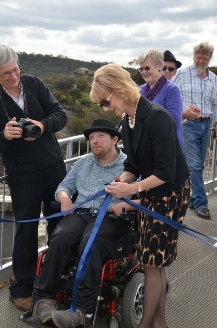 Mayor Maree Statham and Dan Smith officially open the new boardwalk at Hassans Walls lookout.