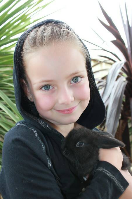 BRIGHT EYES: Chloe Stephenson with her bunny blacky 	lm041014selfie1