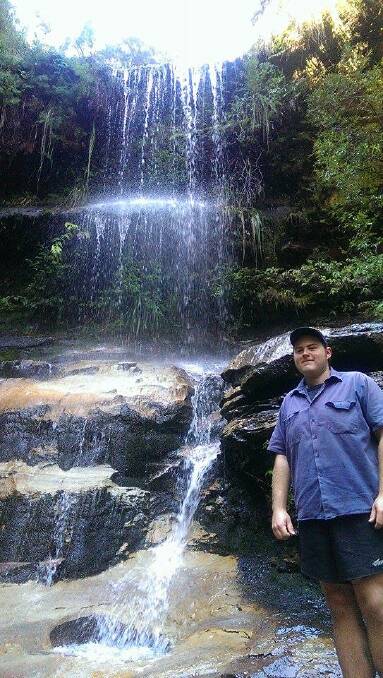A HIDDEN GEM: Tyron Nicholson at the beautiful Ida Falls. 	lm071015tyron