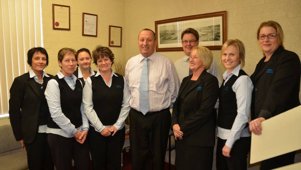 CELEBRATING FOUR DECADES: Ross Higgins, centre, with staff members at the Lithgow practice, Wendy Knight, Jenny McGrath, Courtnie Osmond, Vickie Blaker, Ken Lambeth, Liz Higgins, Connie Edwards and Nicole Stevenson. 	lm061314LA9933