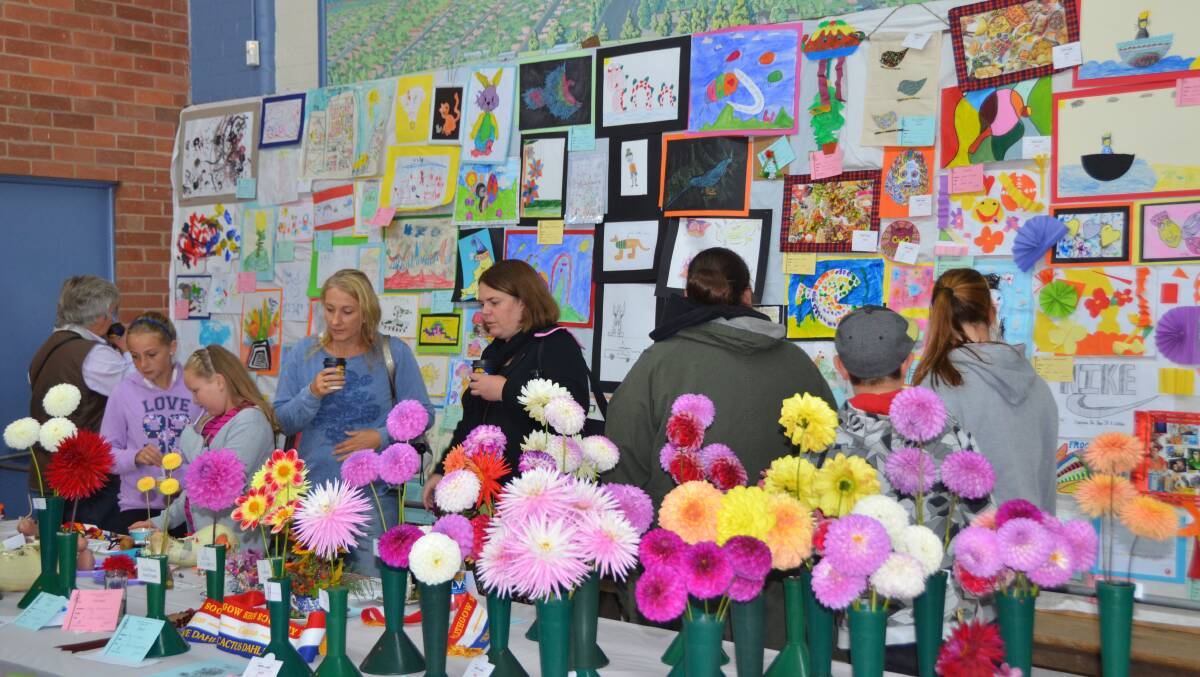 COLORFUL AND TALENTED: Children’s art and award winning flowers combined in a colourful spectacle in the main pavilion at Lithgow Show.