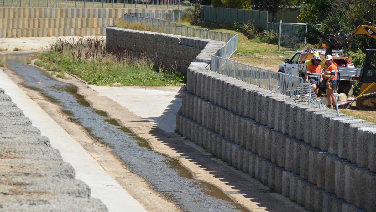 FINAL TOUCHES: Lithgow Council has expressed pleasure at the completion of the latest stage of the Farmers Creek flood mitigation program
between the showground and Albert Street.