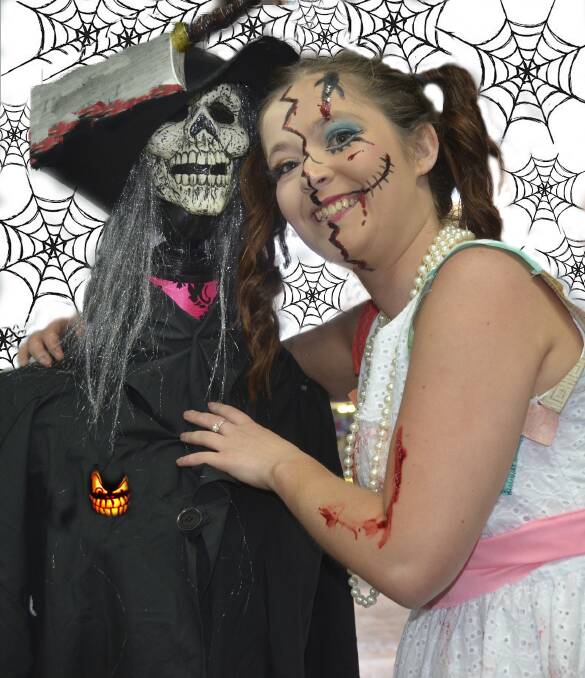 GOING ALL OUT: The Lithgow Mercury’s Angie Cambourn invites the rest of the
businesses to decorate their businesses and make this year’s Halloween one to remember.