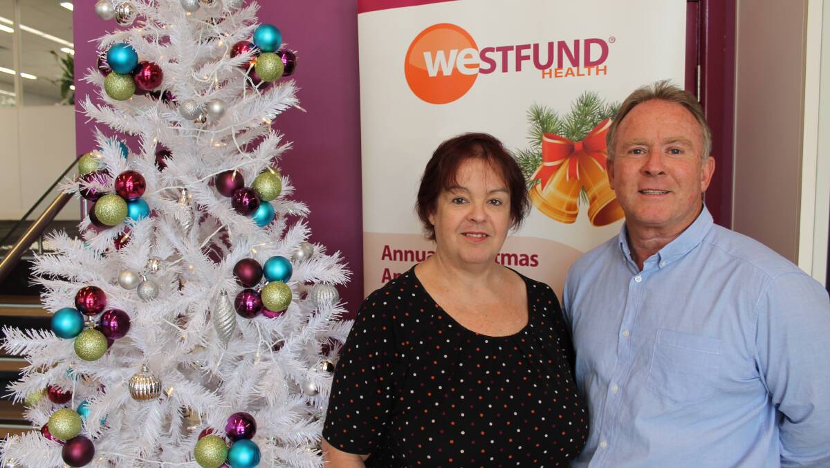 CORPORATE SUPPORT: Christmas and Beyond’s pastor Jim Abberton with Westfund’s acting state manager Sue
Hopkins.