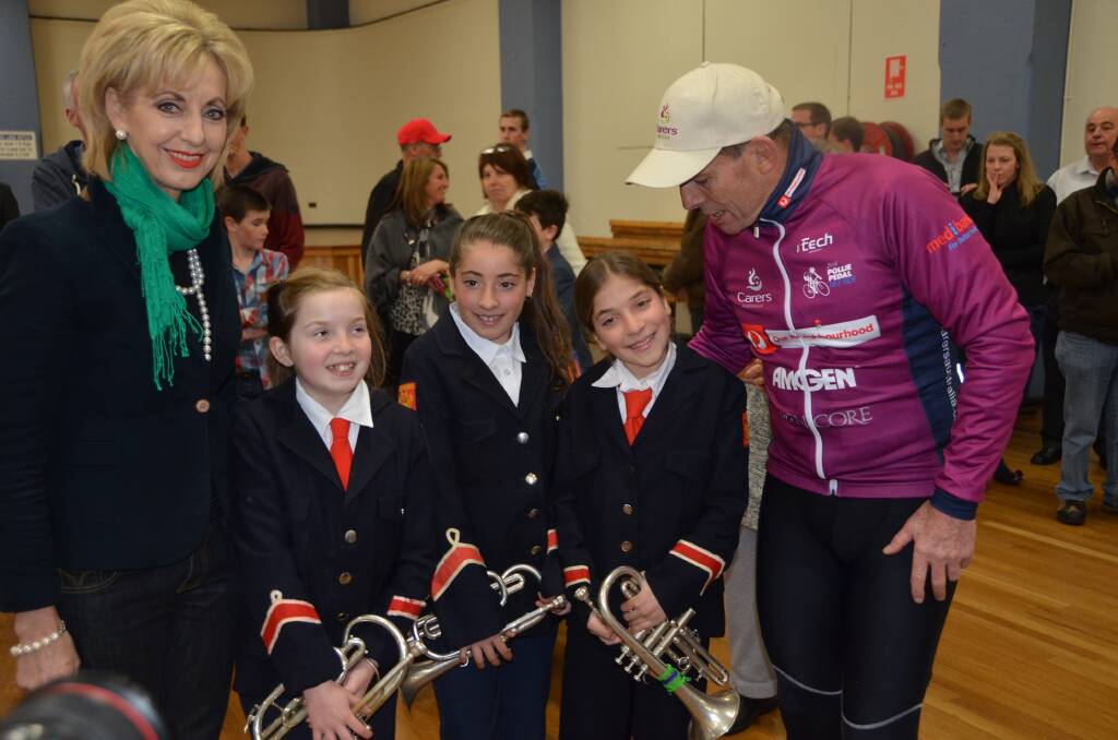 STAR POWER: Prime Minister Tony Abbott spent quite some time at the Civic Ballroom chatting freely with three young Lithgow band members Grace Glendinning 11 and sisters Leila, 10 and Sally Romanos 12. 