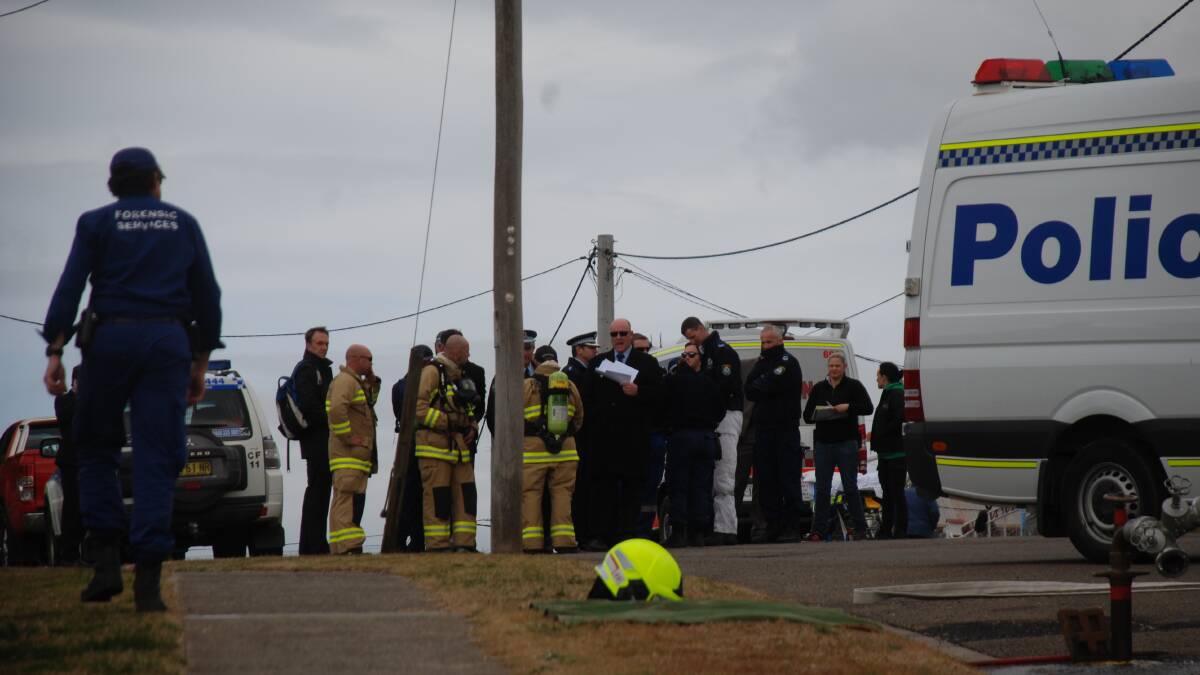 POLICE and other emergency services during a briefing at the murder scene in Portland. (Photo: SHANNON BELLAMY)