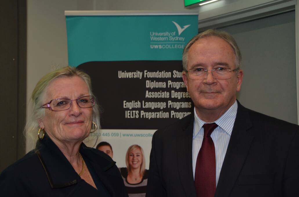 HIGH profile corporate and academic figure Peter Graham with UWS College CEO Dr Kerry Hudson at this week’s public lecture at the
Lithgow campus. Mr Graham’s mother was a Lithgow girl while his father came from Portland.